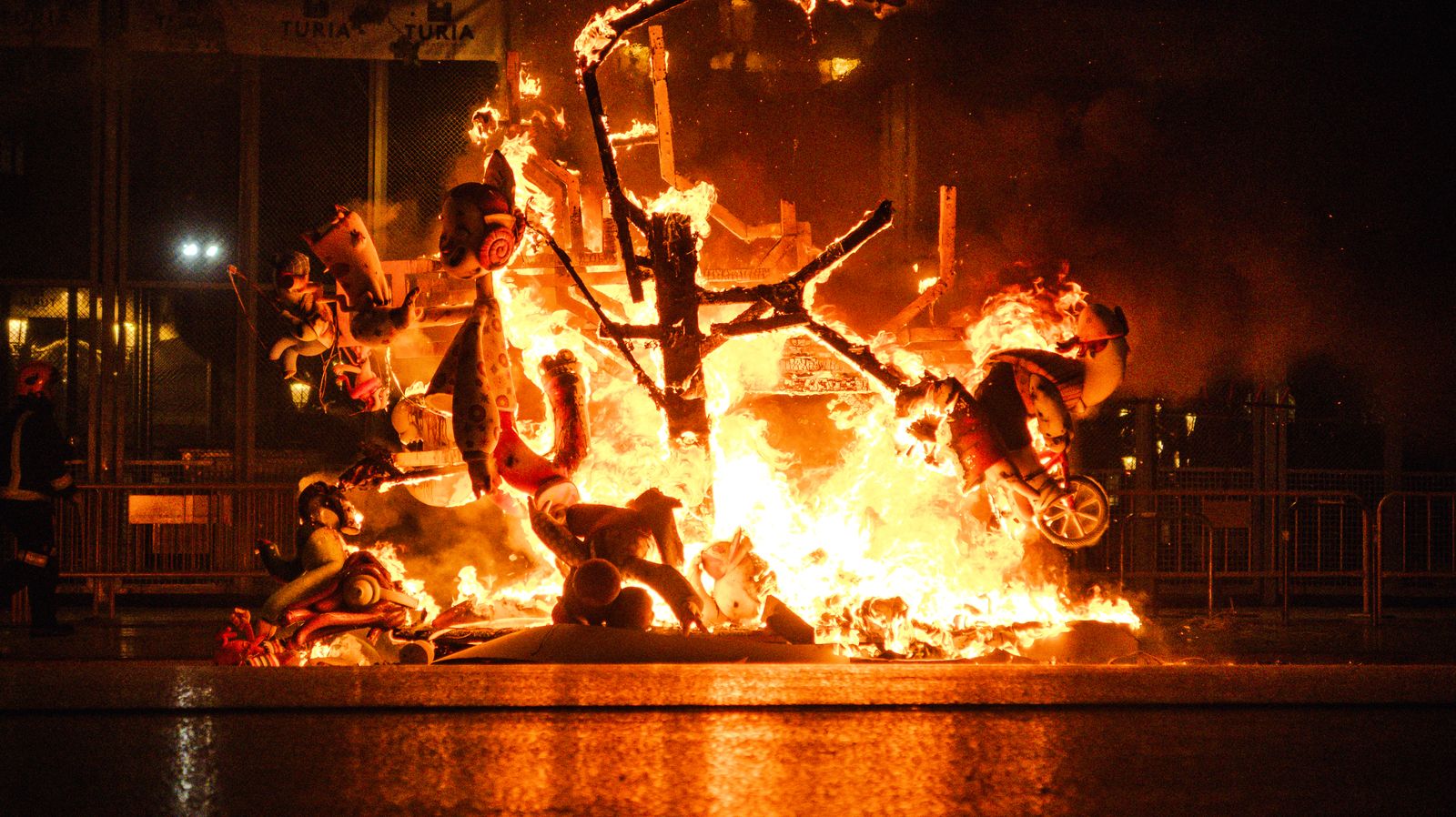 Fallas monument burning at night in Valencia