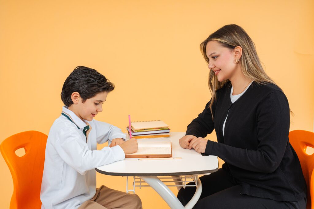 Teacher helping a student during a lesson