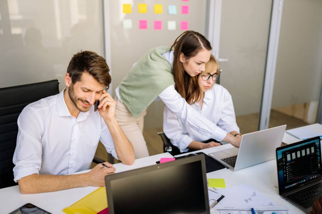 Young professionals working together at a meeting table